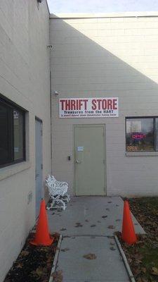 The thrift store is located on the side of the community building and you'd never know it was back there.