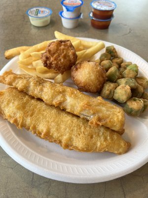 Battered fish with hush puppies , okra and fries