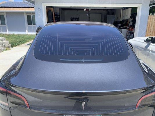 2018 Tesla Model 3 (rear view).  Rears at Limo.