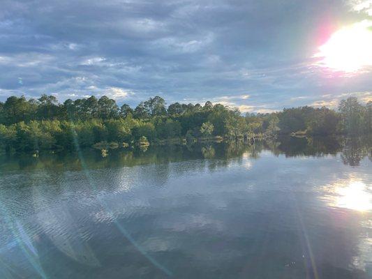 This is a photo of the sun setting taking from the bridge.