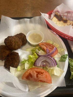 This is the falafel plate. They are delicious! So is the bread and hummus!  Enjoy!