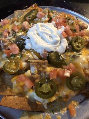 Baked heaven. I mean nachos. Every chip Is the perfect bite.