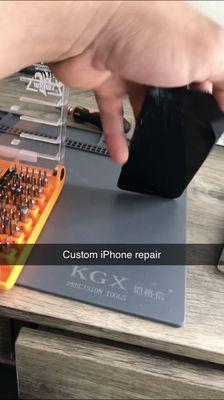 Customeb IPhone 7 Repair; 1 of 1 with red back and black screen