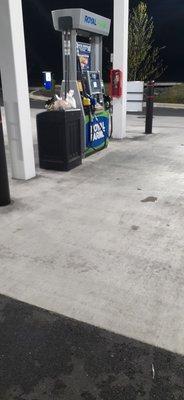 Royal Frams garbage receptacles overflowing at each pump.