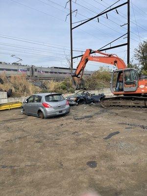 Preparing junk cars to get shipped out of the yard. Call now to get cash for your junk car. Free removal.