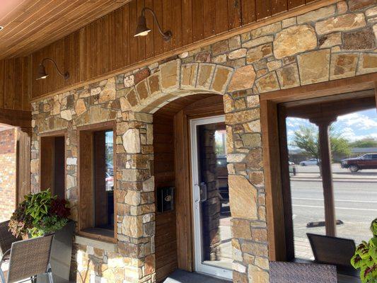 The front of the restaurant as seen from the sidewalk outside.