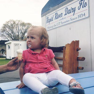 Miss Cora isn't sure about her first ice cream!