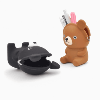 Coins, chapstick, a pen, or anything you choose in this adorable snap closure friend.