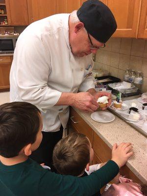 Decorating birthday cupcakes with Chef Dan.