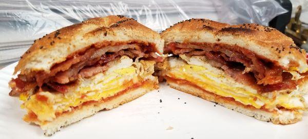 Double egg, bacon and cheese on a toasted hard roll.