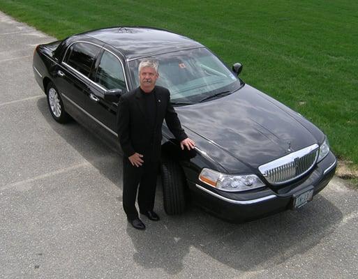 Captain Eric and one of our luxury Lincoln Town Cars.