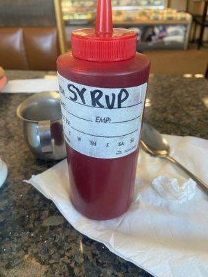 Ketchup bottle that has syrup