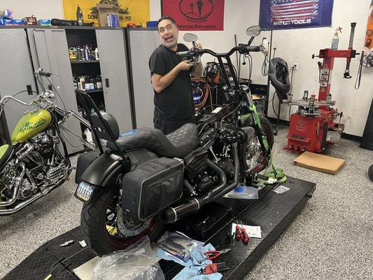 Crazy Steve installing 16" T-bars on this 2016 Harley Davidson Dyna Street Bob