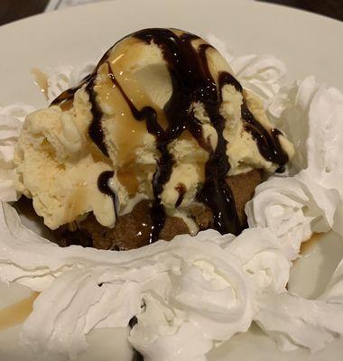 Warm chocolate chip cookie with chocolate, caramel sauce, and whipped cream... soo good