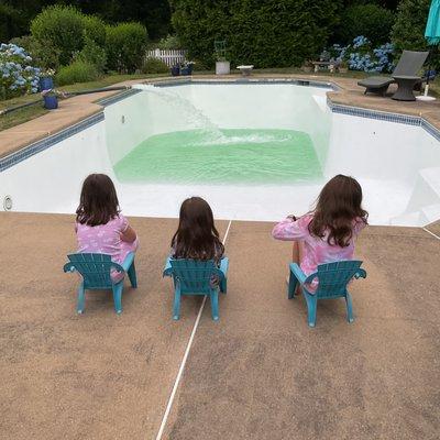 Yet another happy crew with their freshly painted pool in Barrington RI summer 2024! Kids gave it a  and enjoyed the water delivery