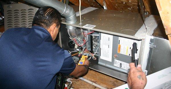 Lead tech Tony performing a check-up on a customers hvac system.  See specials at https://extremecomfortac.com/current-ac-specials/