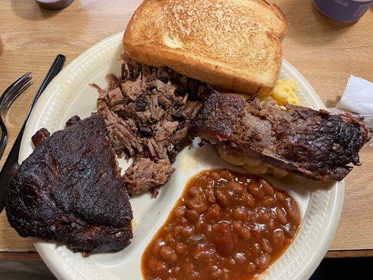 Chopped brisket, spare ribs, spicy beans and toast