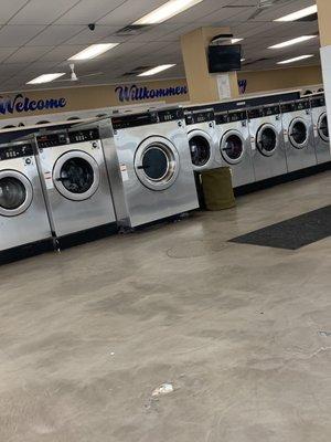 Large capacity washer in the midst of regular sized washers