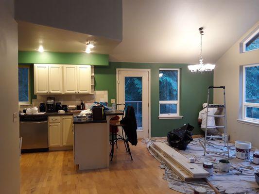 Saul painting my kitchen and dining area