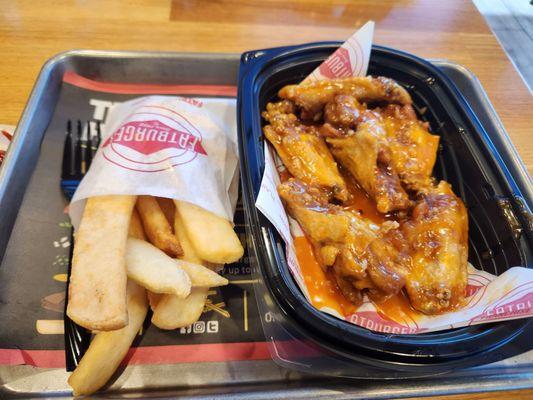 6 piece honey garlic wings with fat fries