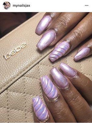 Coffin nail shape with Unicorn designs. Visit us on Instgram @Mynailsjax for more nail design inspirations.