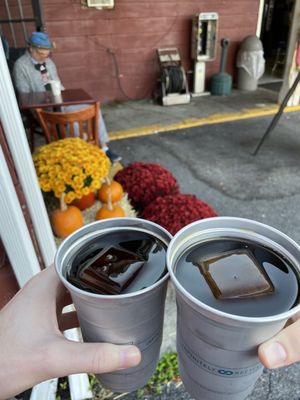 Cold brew to go in these cool aluminum cups. Ice cube is made of coffee, so it doesn't get watered down.