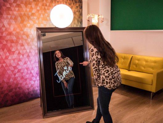 Sign your pictures right on the touchscreen mirror