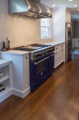 This kitchen got a total facelift, with a blue star range and custom cabinetry.