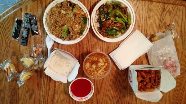 $28 haul. Clockwise: Vegetable Fried Rice, Beef-Broccoli, Egg Rolls, Orange Chicken, Hot & Sour Soup, Sweet & Sour Sauce, Steamed Rice.