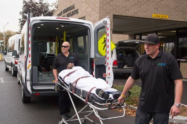 We provide stretcher service, using up to two people, if required.