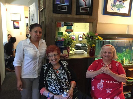 Jackie is all smiles with Judy and Debbie.