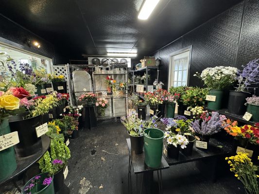 Here is the refrigerated "flower bar" where you can choose which flowers you'd like. Everything is labeled with prices.