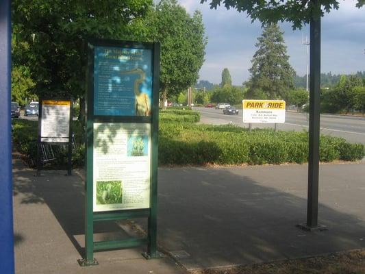 The main entrance and a sign talking about the herons.