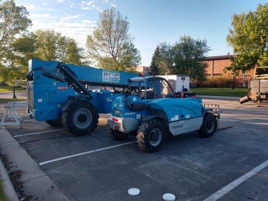 Matching big and Small Genie Telehandlers 5519 - 19' 5500lbs 1056 - 56' 10,000lbs