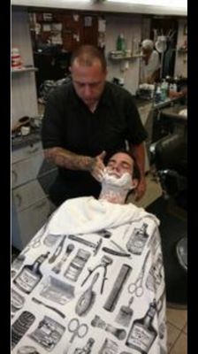 We offer Hot towel straight razor shaves !