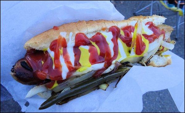 Delicious Dogs serves a truly delicious hot dog, wrapped in bacon, and grilled to perfection.  How often do you find bacon wrapped hot dogs