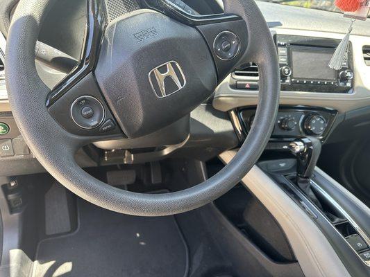 Steering wheel well cleaned as well as gear shift and radio