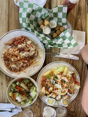 Perfect for a quick dinner. Chicken parm pasta, crust chicken salad, fried cheese bites (half spicy, half reg).