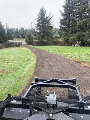 We can refinish your gravel road or driveway in no time!