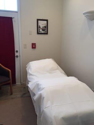 Clean and comfortable private treatment room