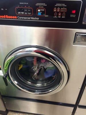 This takes 18 quarters. My favorite sized washer. It fits an entire tall laundry basket.