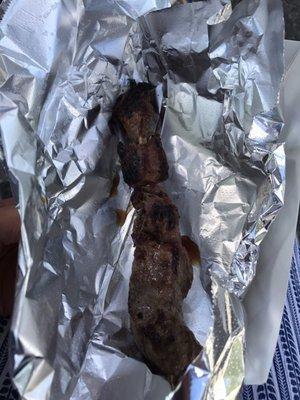 Over priced, over cooked, dried unseasoned beef skewer