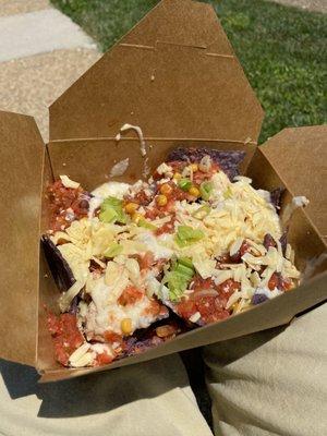 Smoked chicken nachos.  Has black bean and corn salsa with cheese, onion, and chips.  Tasty!  [GF]