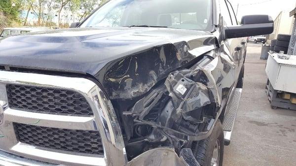 2015 Dodge Ram . Replaced fender, hood and lt fender rail. Do not have finished photo, but it looked great.