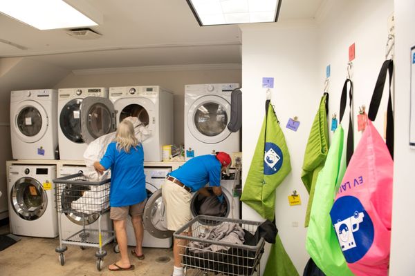 Employees washing laundry