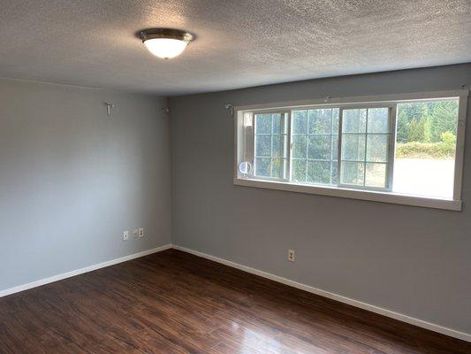 After flooring install and popcorn ceiling removal.