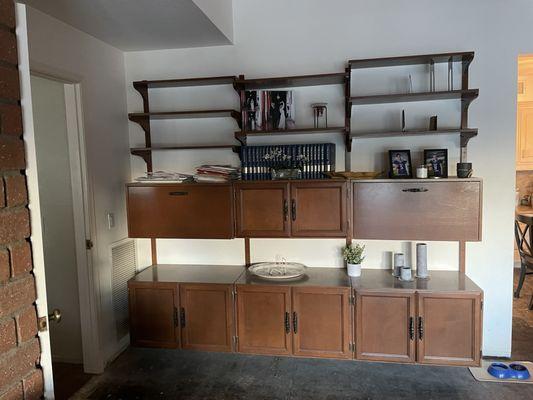 Before before before a mid-century bookshelf/cabinet