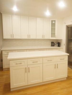 White Shaker cabinets and quartz countertops