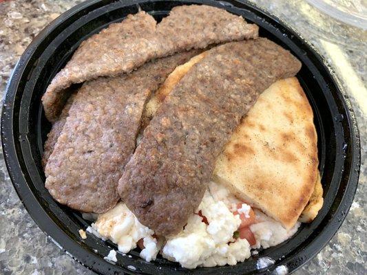 Greek Burrito Bowl - gyro meat, seasoned rice, tomato, onion, parsley, feta, pita bread and tzatziki