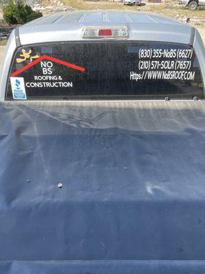 Work truck with No BS roof logo and BBB sticker installed.